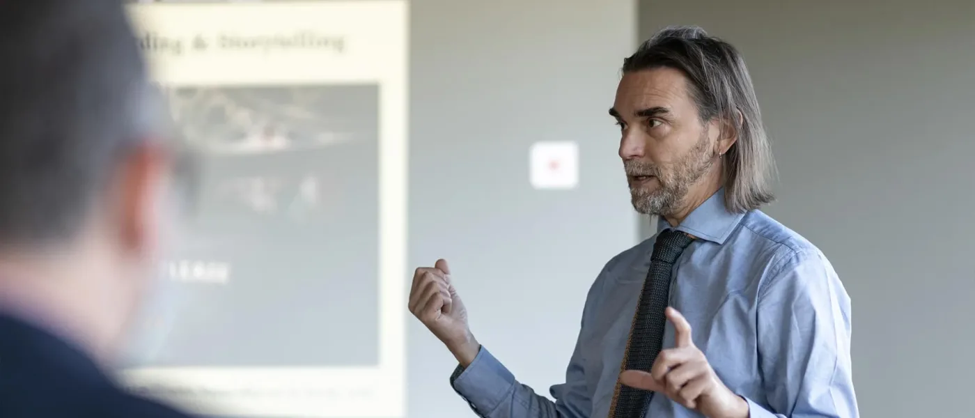 Professor Massimiliano Fusari in class with H-FARM students